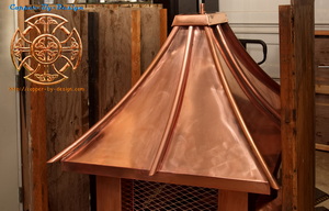 A concave curved roof style copper chimney cap