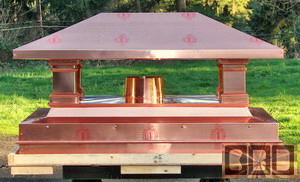 A Grecial style copper chimney cap for Trainor in Fairhope, Alabama
