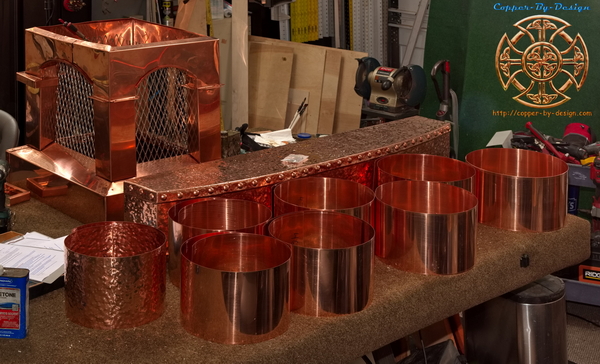 A copper clad fireplace mantle