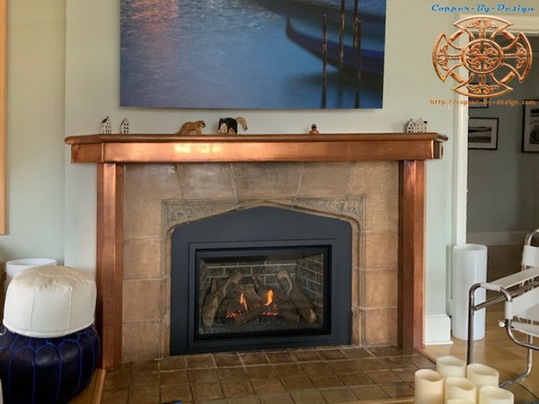 A copper clad mantle with a pair of pillars